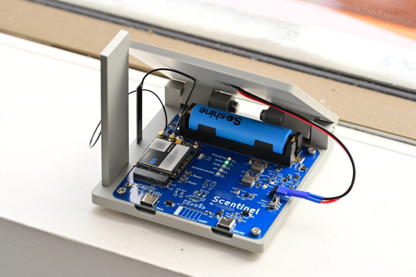 Scentinel environmental sensing device